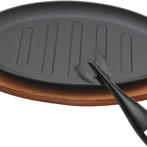 Cast iron steak plate with wooden base, round fajita server for household and restaurant use.