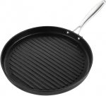 Round cast iron grill pan with stainless steel handle, pre-seasoned ribbed surface for steak and burgers.