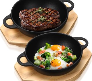 Mini cast iron skillet set with wooden base, small plates for fajitas and hot steak dishes, 9.45-inch size.