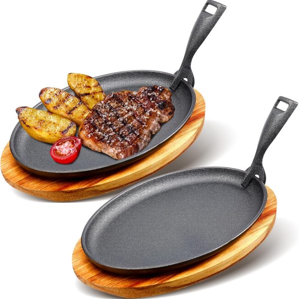 Cast iron skillet set with wooden base and removable handle, suitable for restaurant and BBQ events.